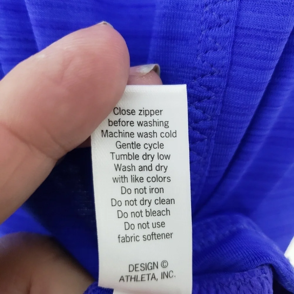 Athleta sleeveless, back ruching, front zipper top